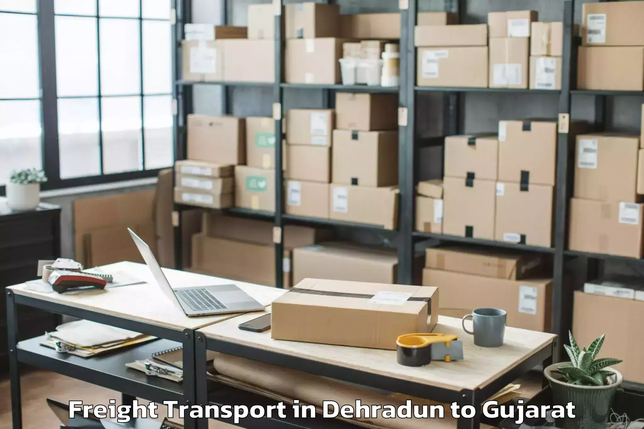 Discover Dehradun to Kotda Sangani Freight Transport